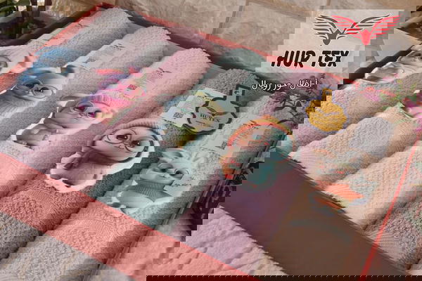 فوطه أطفال 5ق حور تكس Image 1 Preview