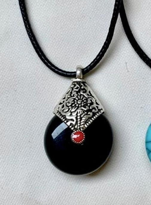 black necklace Preview Image