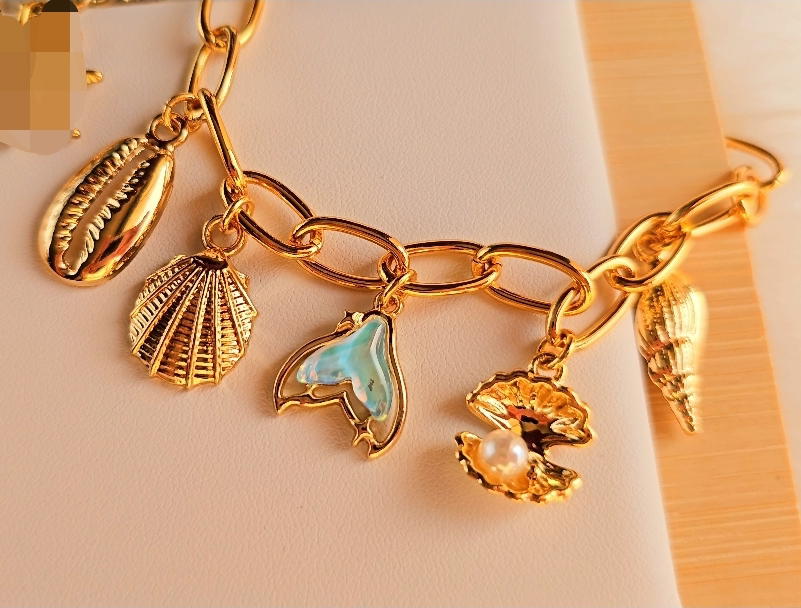 انسيال بدلايات اشكال بحرية مختلفة(b13) sea shapes charms bracelet Preview Image