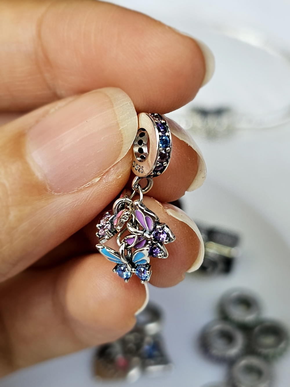 دلاية الفراشات الملونة () Colourful butterfly charm Preview Image