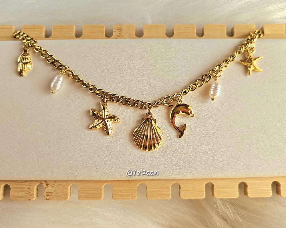 sea different shapes necklace (N17) سلسلة اشكال بحرية متنوعة Preview Image