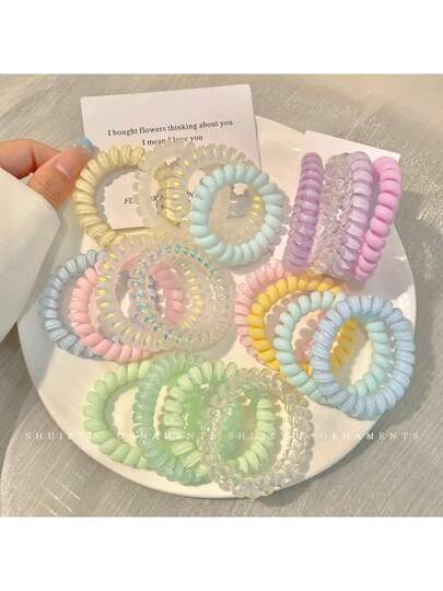 Hair Tie / Coil Hair Tie استك حلزوني عدد ٤ Preview Image