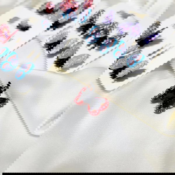 Hair claws/ Butterfly hair claws 4 on card- فراشة كلبسات ٤ في الكارت  Image 2 Preview