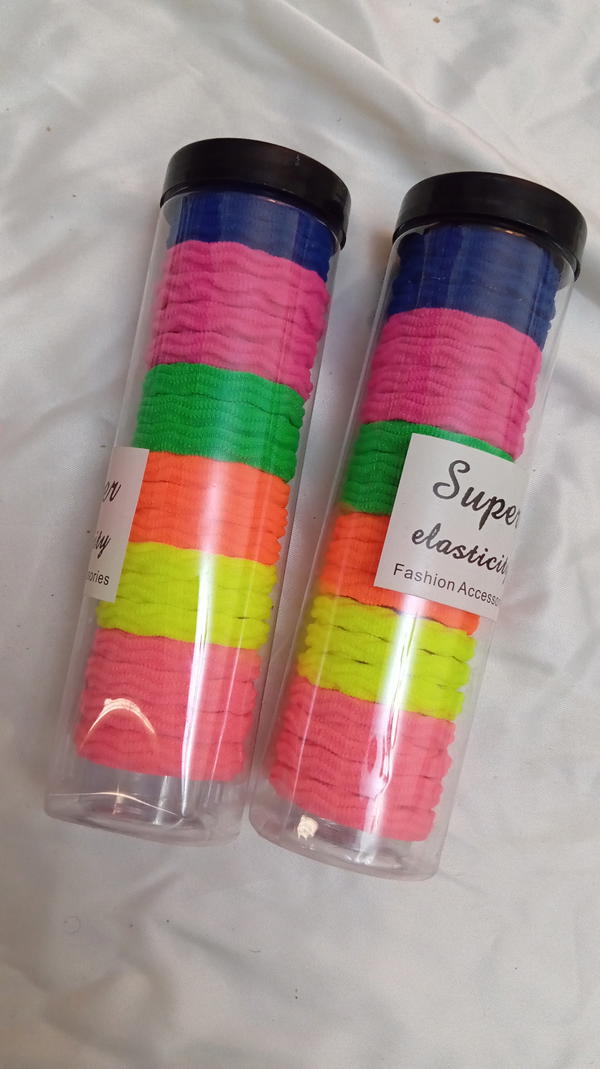 hair ties/ علبة توك استك ملونة 20 توكة hair ties tube about 20 Image 2 Preview