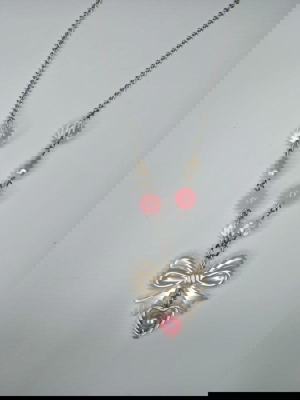 pink bow necklace Image 1 Preview