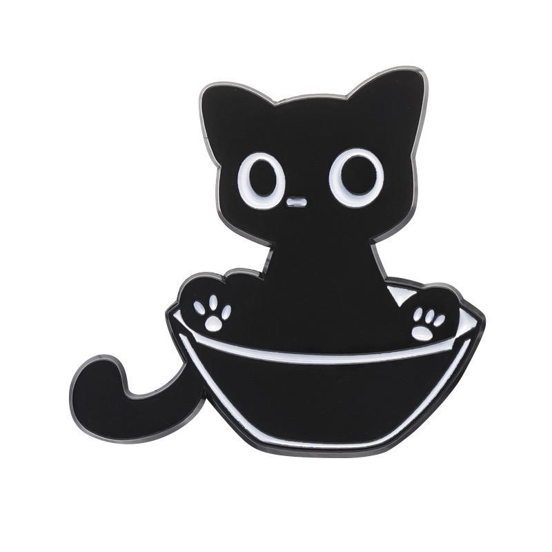 Black cat in bowl Preview Image