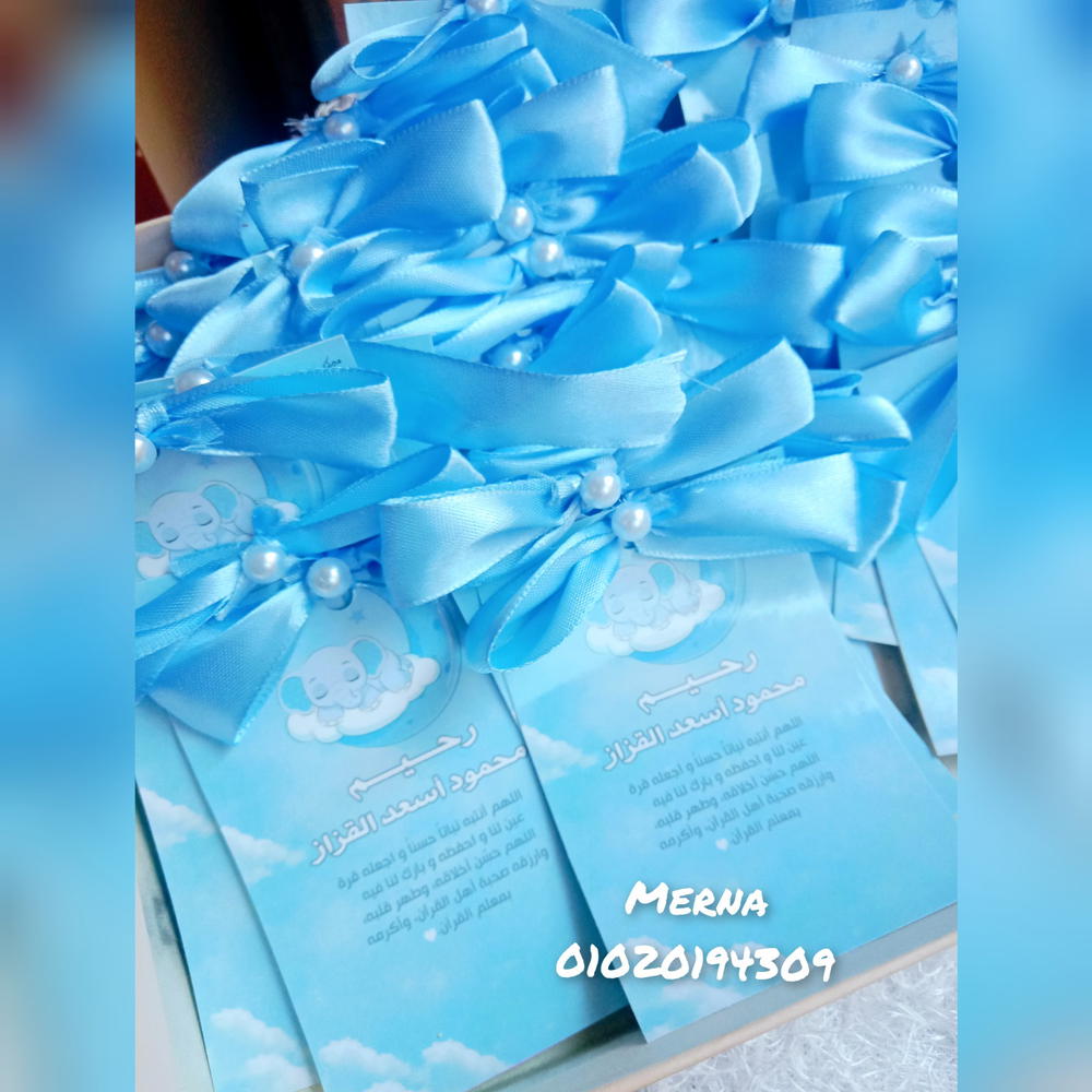توزيعات سبوع بالفيونكة مقاس 7*10💙 Preview Image