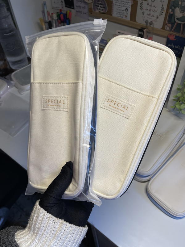 مقلمة SPECIAL لون اسود في بيج🫶🏻 Image 2 Preview