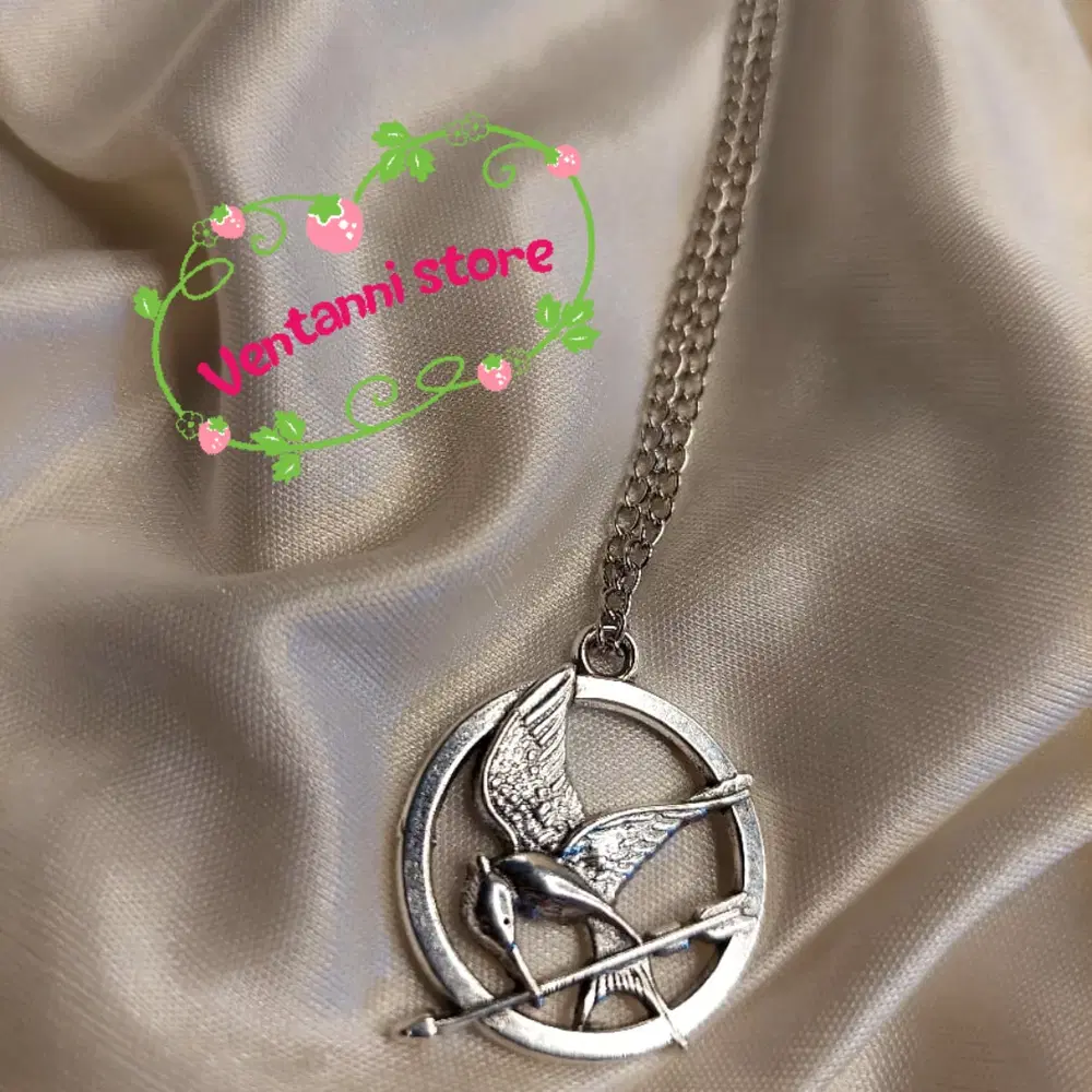 Hunger game 🎯 Necklace Preview Image