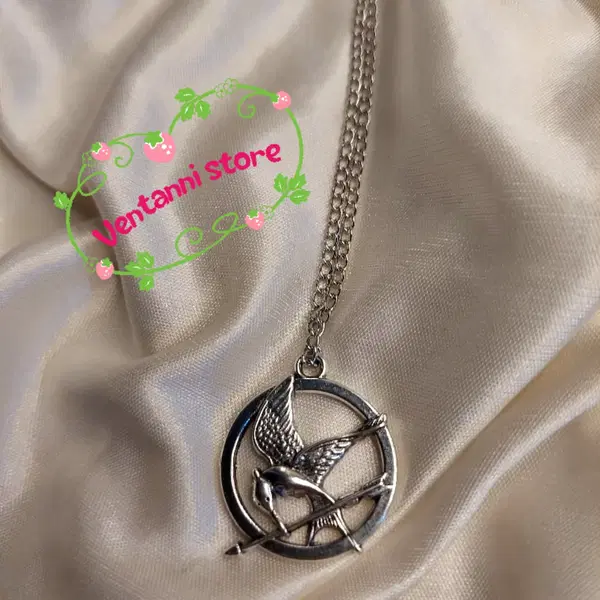 Hunger game 🎯 Necklace  Image 2 Preview